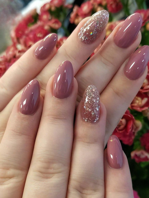 Gel nail art pink gold